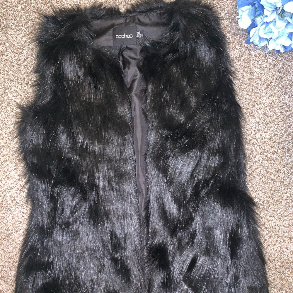 Black faux fur vest